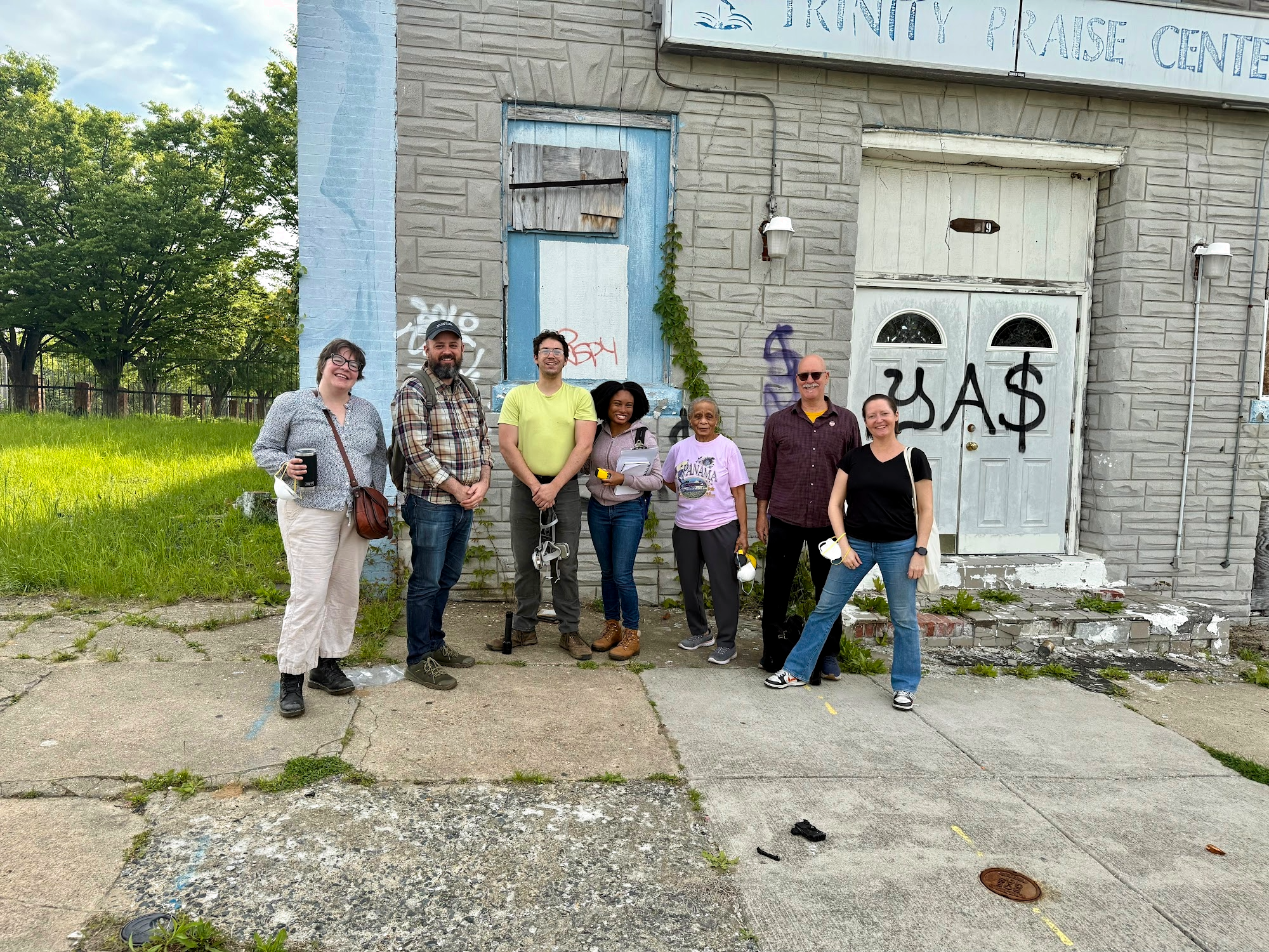 photo of people in front of a building